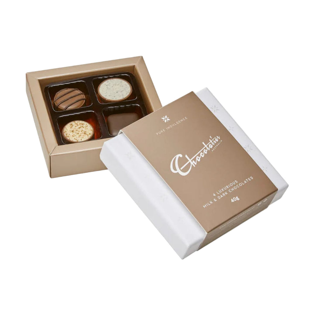 Close-up of 4 pack truffle chocolate assortment gift box