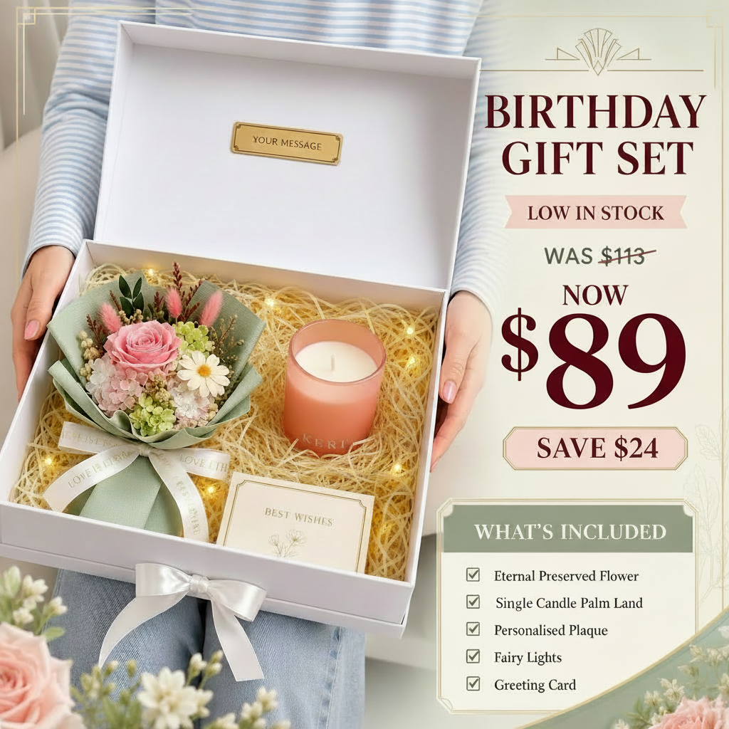 A gift set presented in an open white box held by a person, featuring a small pink floral arrangement, a pink candle, fairy lights, a card, and a personalized plaque. Promotional text on the right reads 'BIRTHDAY GIFT SET' with pricing and included items.