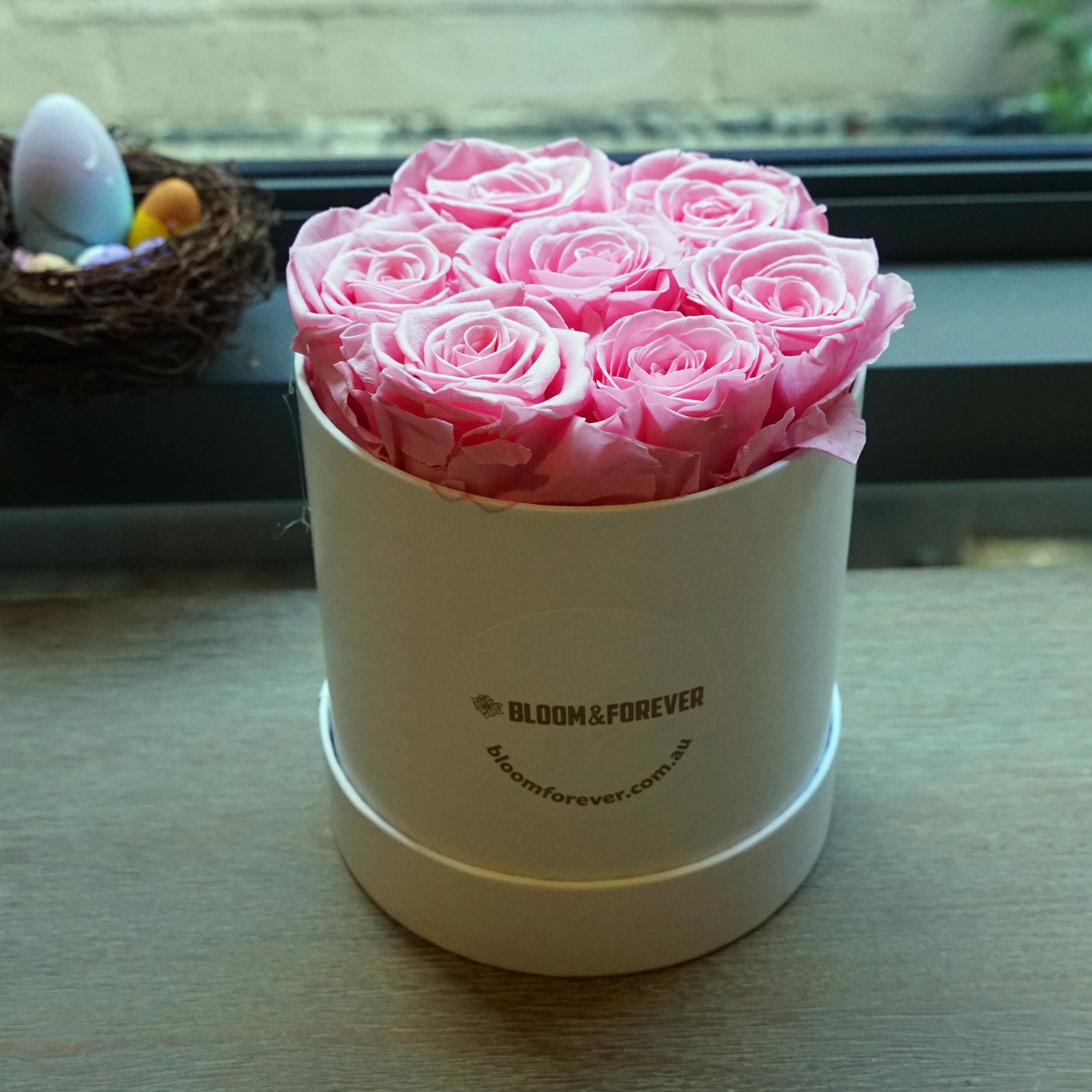 Close-up of purple classic round eternal rose gift box design