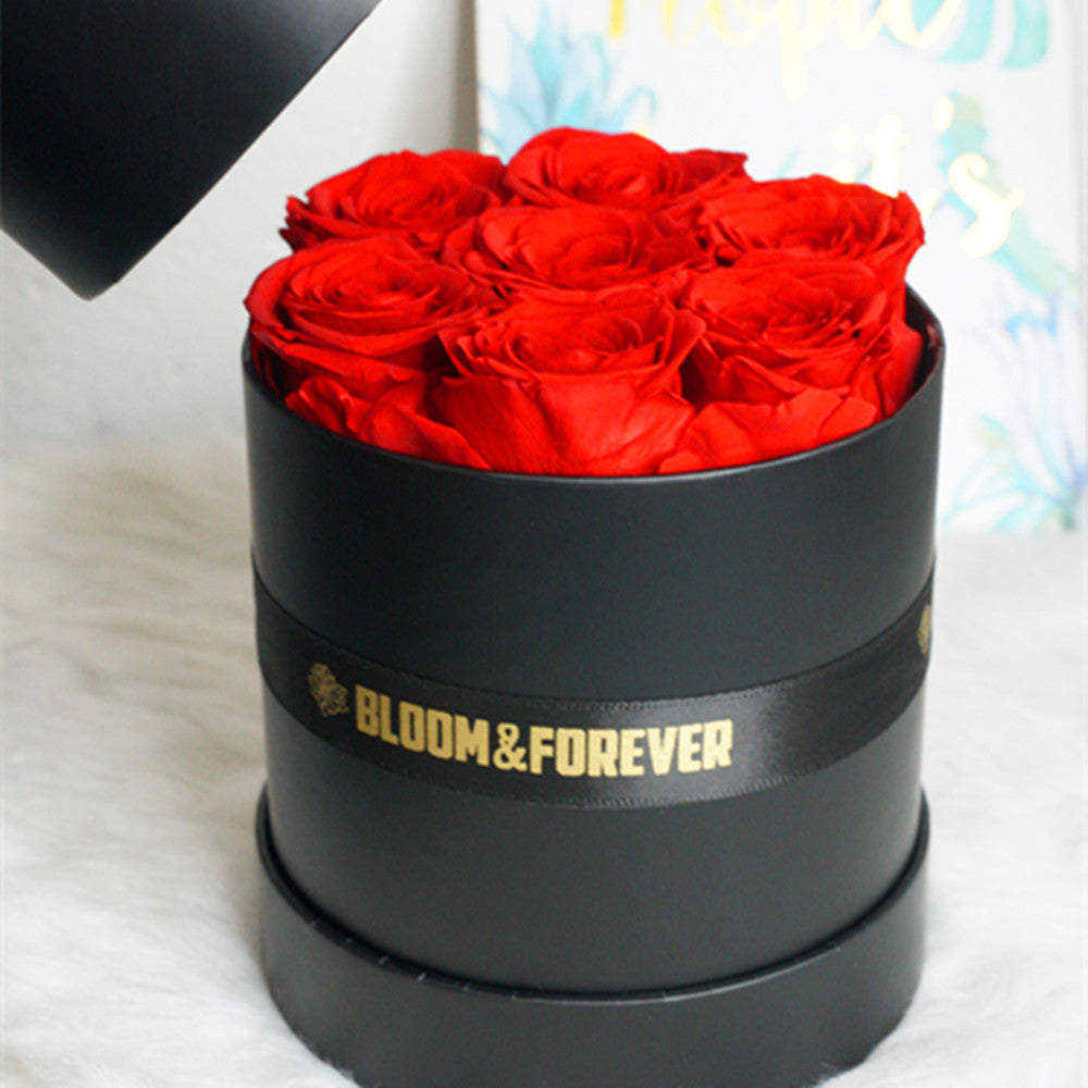 Close-up of red classic round eternal rose gift box design