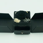 Close-up of black dual-door eternal rose jewelry box design