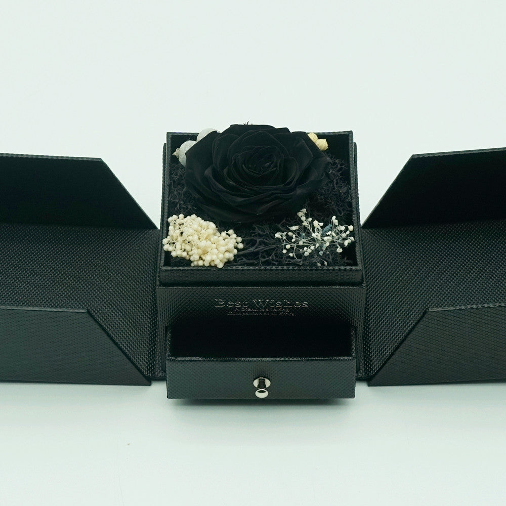Close-up of black dual-door eternal rose jewelry box design