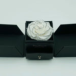 Close-up of white dual-door eternal rose jewelry box design