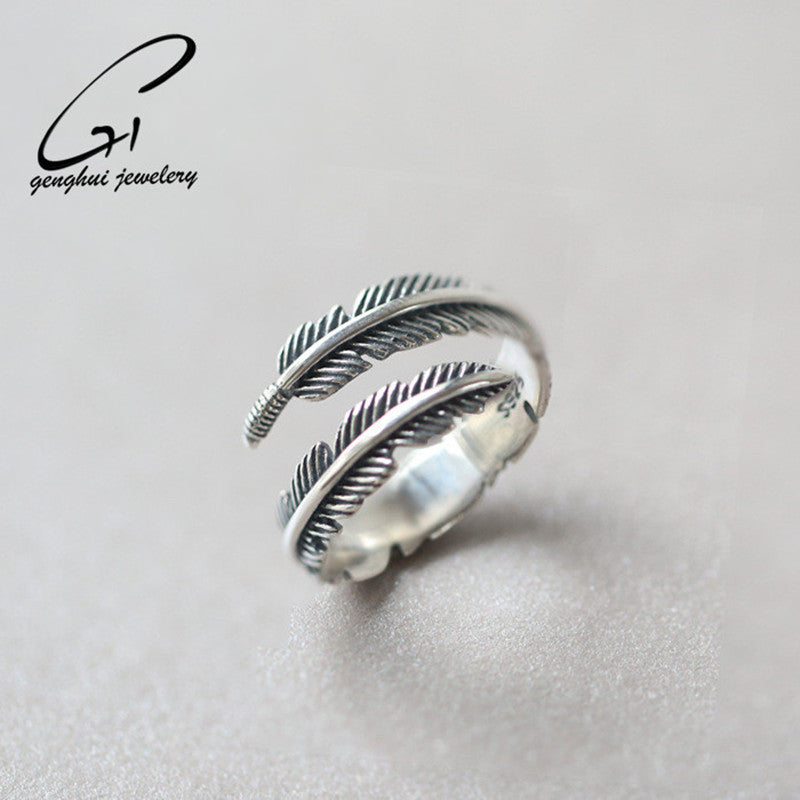 Elegant feather open silver ring, front view