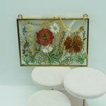 Eternal pressed bouquet in metal frame landscape, front view