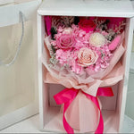 Fairy Light Eternal medium bouquet in blush, displayed in gift box