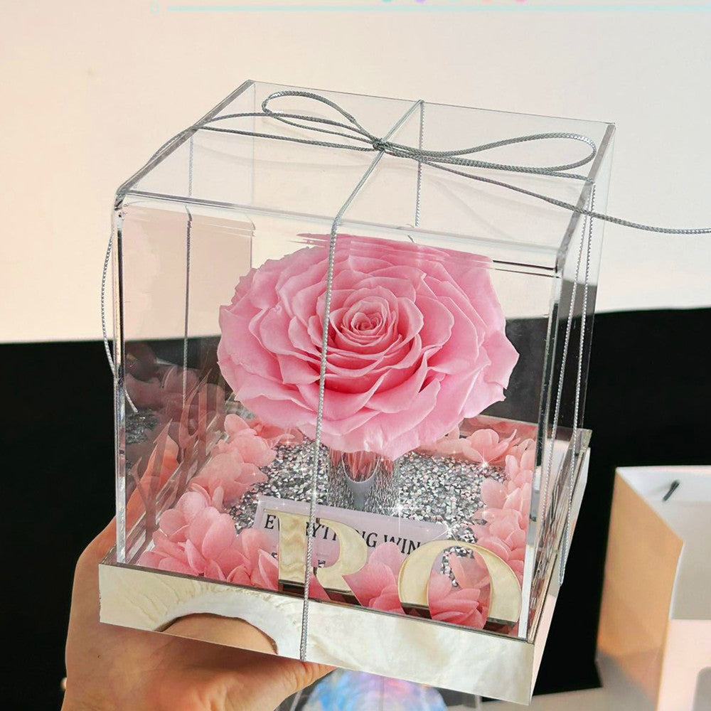 Giant eternal pink rose in acrylic box, front view