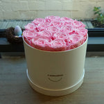Close-up of pink grand round eternal rose gift box design