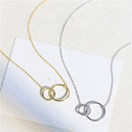 Minimalist silver double ring cross necklace in gold and silver together