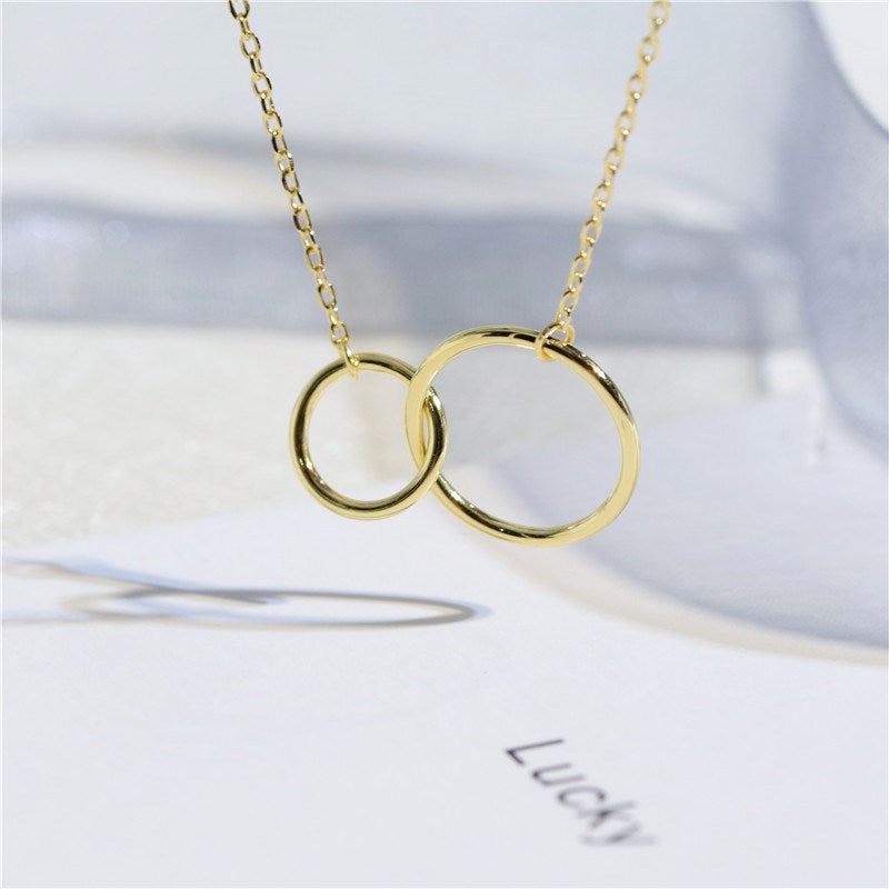 Minimalist silver double ring cross necklace in gold