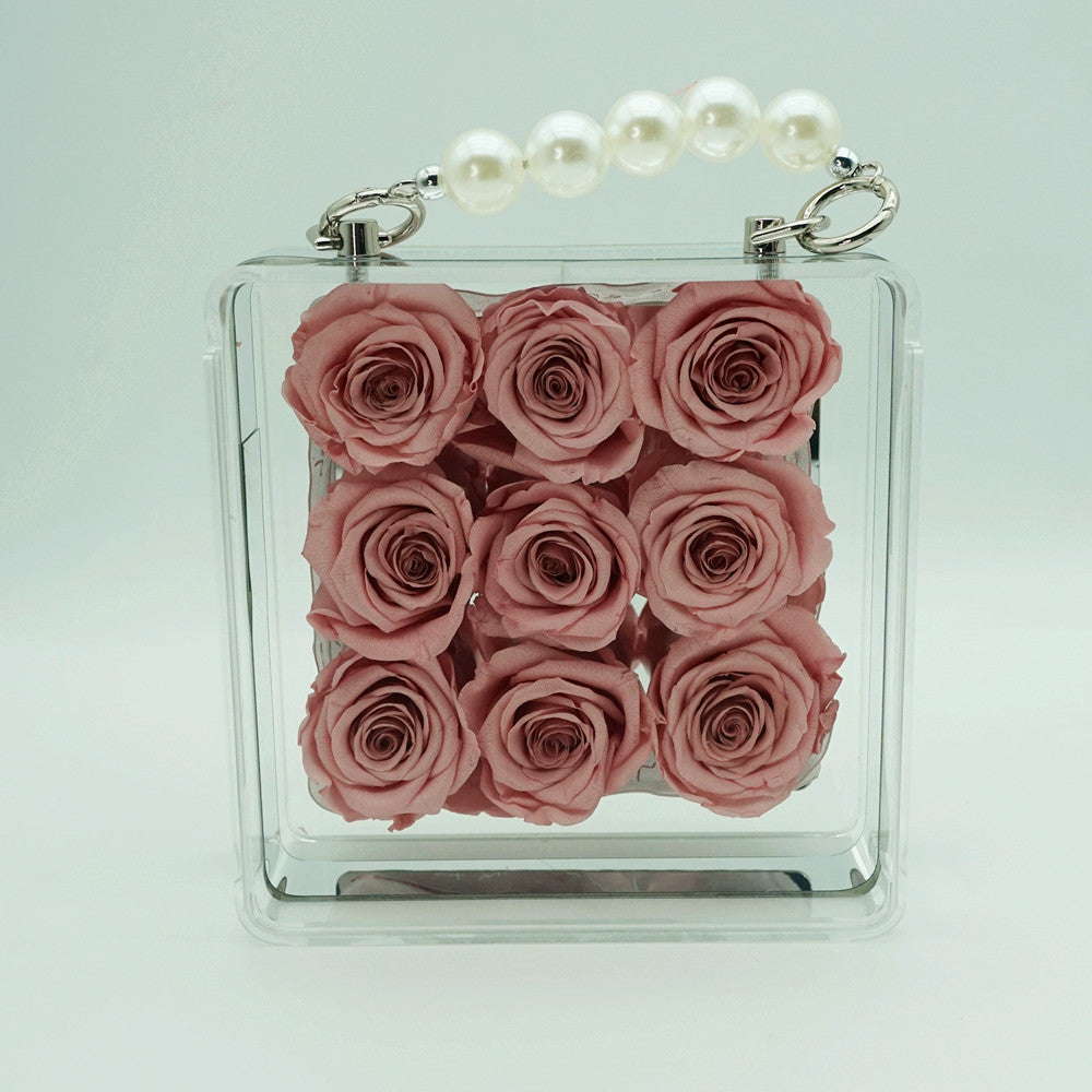 Petite eternal pink rose in acrylic handbag gift box, front view