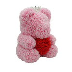 Close-up of pink rose bear with red heart, 40 cm