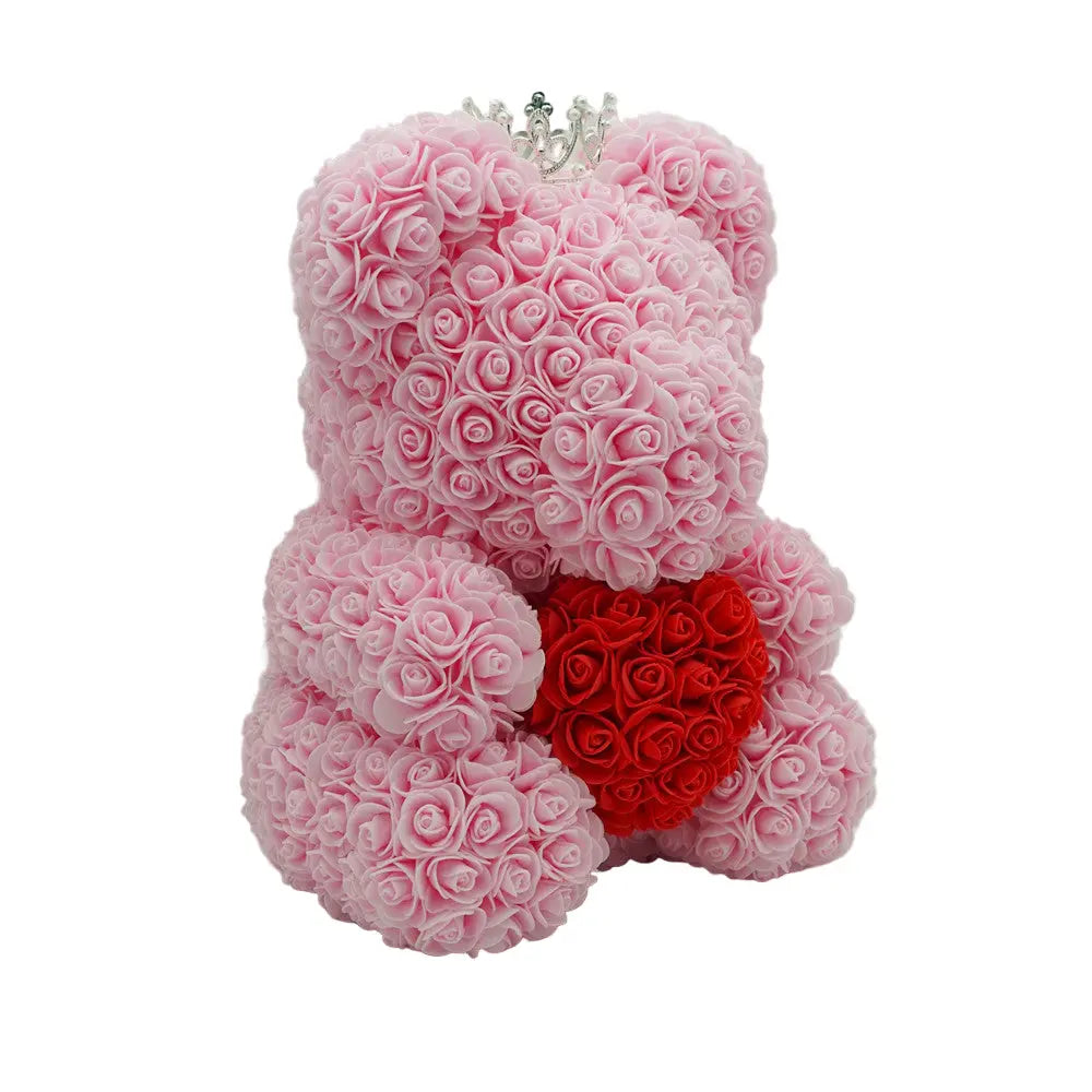 Close-up of pink rose bear with red heart, 40 cm