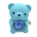 front of authenticity for blue rotating eternal rose bear