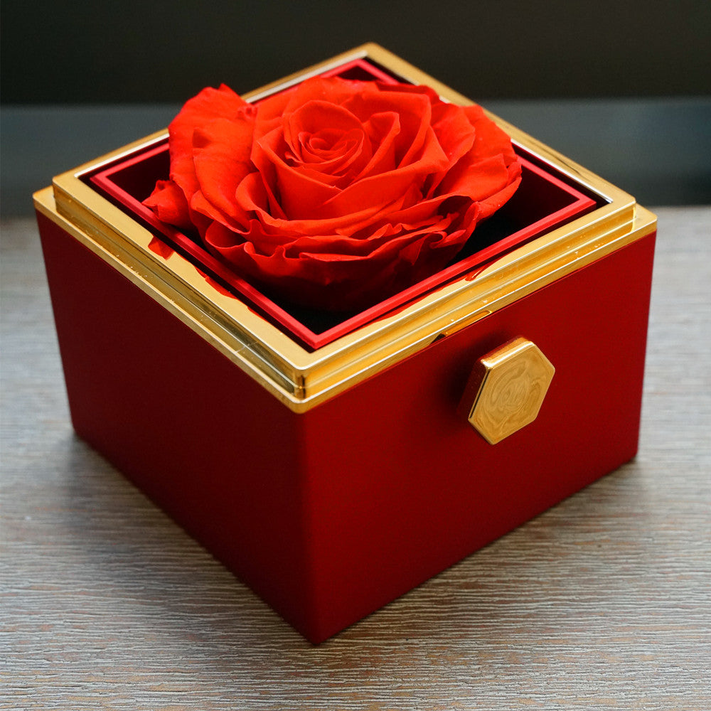Close-up of red rotating eternal rose bear details