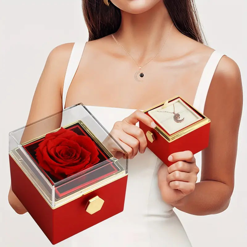 Front view of red rotating eternal rose and jewelry gift box