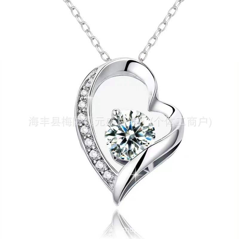 Sparkling zircon heart necklace in silver, front view