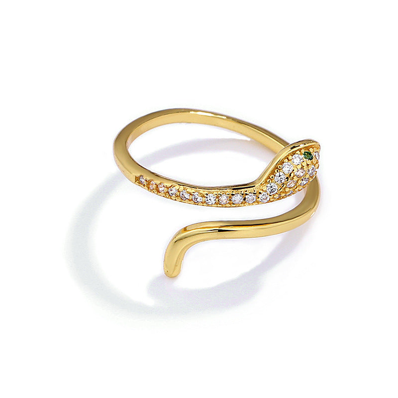 Sparkling zircon snake ring in gold, front view
