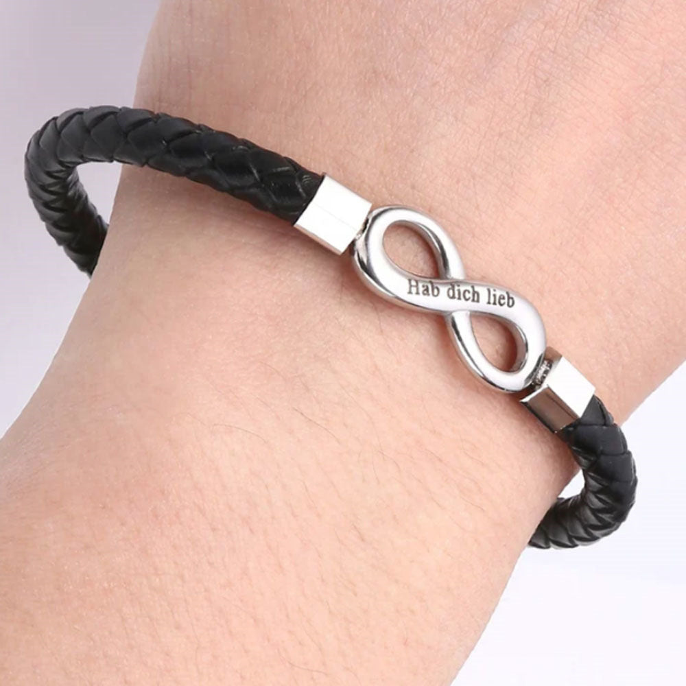 Close-up of trendy 8-shaped men’s leather bracelet