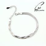 Close-up of trendy multi-strand serpentine bracelet design