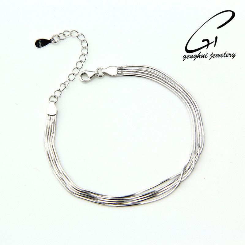 Close-up of trendy multi-strand serpentine bracelet design