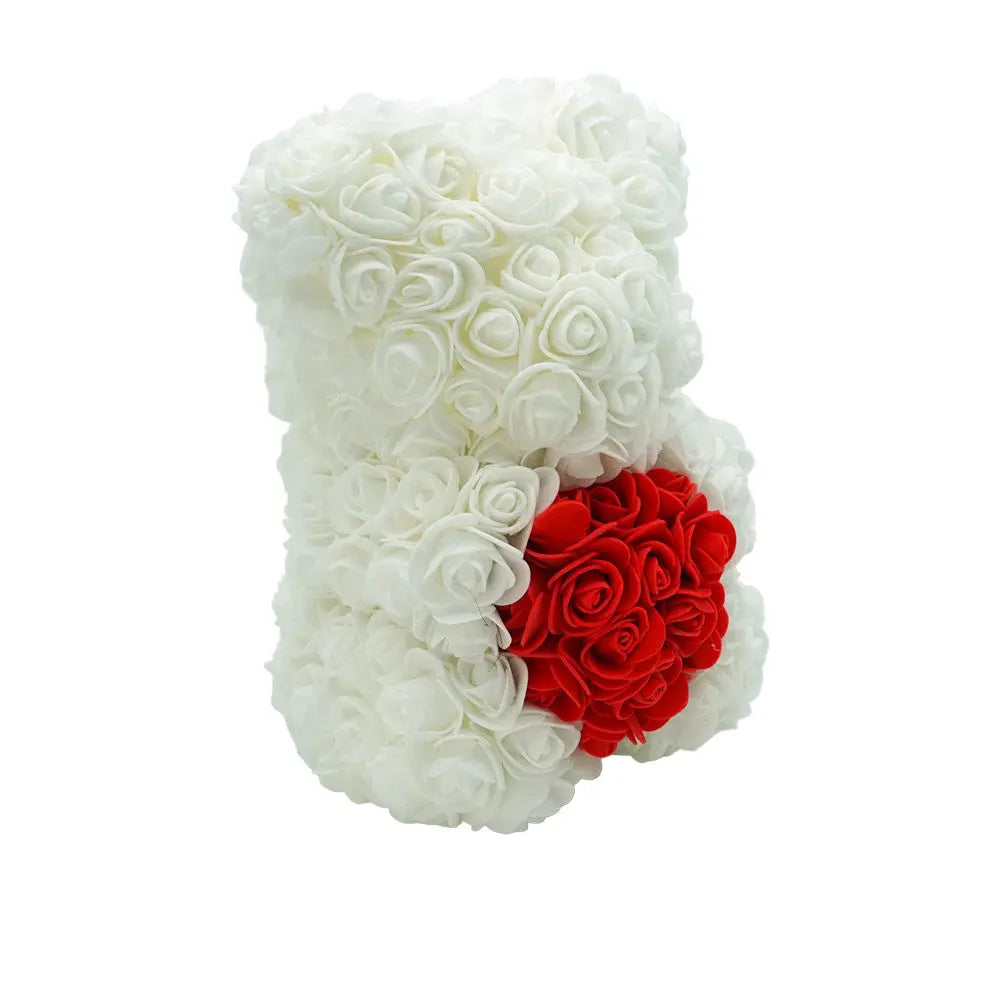 Close-up of white rose bear with red heart, 25 cm