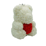 Close-up of white rose bear with red heart, 40 cm